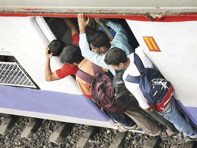 Mumbaikars will have to get used to the idea of doors that close automatically on local trains. File pic
