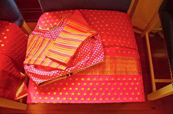 A pink, Chanderi saree with a gold zari border;