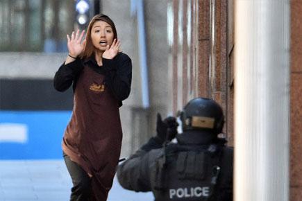 Sydney siege: Gunman claims planting bombs in city