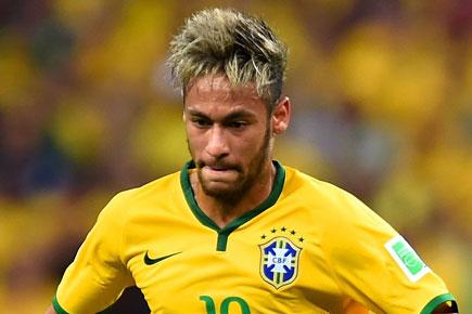 Ailing Neymar scores all four as Brazil rout Japan