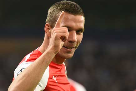 Champions League: Arsenal boss Wenger thanks Podolski for late birthday gift