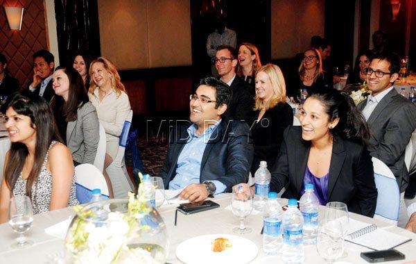The visiting students look amused during their interaction with SRK 