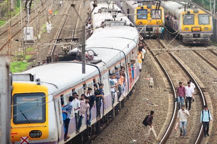 Passengers are fined, but railway staff have special permission to cross tracks
