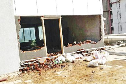 BMC hammer falls on illegal walls, canteen of Goregaon building