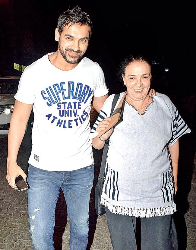 John Abraham (left) was spotted with his mother Pheroza in Bandra on Monday