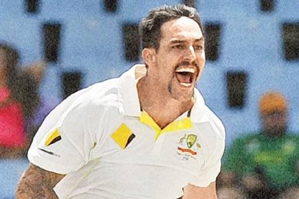 Australia's Mitchell Johnson bares his fangs again as South Africa surrender