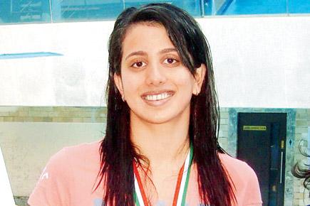 Dhumatkar betters her own mark at Swim Gala