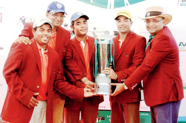 Members of the victorious Navratna Ahmedabad Team pose with their trophy at the Bombay Presidency Golf Club, Chembur on Saturday