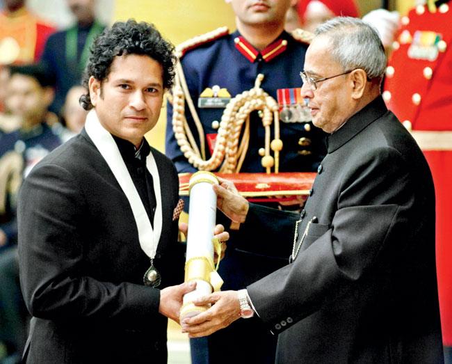 Career high: Sachin Tendulkar receives the Bharat Ratna award from Indian president Pranab Mukherjee in New Delhi yesterday. Pic/AFP