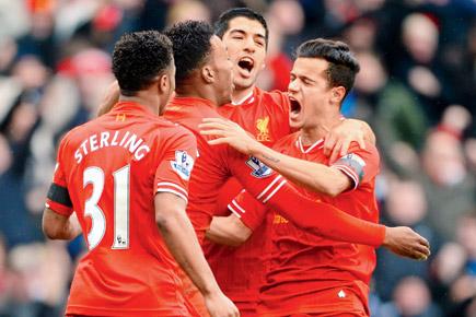 Liverpool keep Premiership hopes alive by thrashing Arsenal 5-1