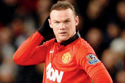 Wayne Rooney admits title probably beyond Man United