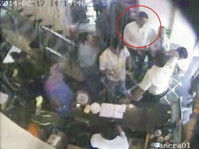 CCTV footage showing Shrinivas Shetty (circled), the owner of Aditi, during the fight