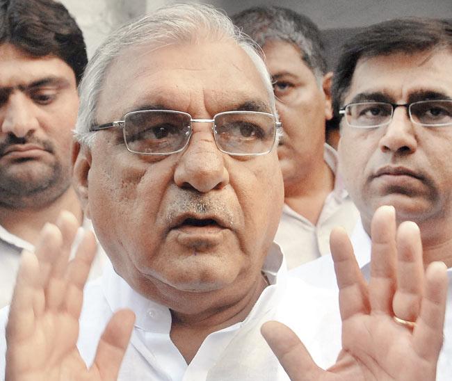 Haryana CM Bhupinder Singh Hooda was saved after the shoe fell short of its target. This is the second attack in a month on Hooda. File pic