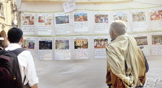 At the stall, people read about Gandhi’s life