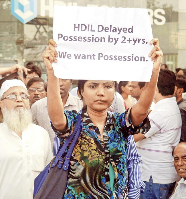 Frustrated with delay: Aggrieved homebuyers staged a protest outside HDIL’s Bandra office in January, and plan to carry out a similar agitation on March 1. File Pic