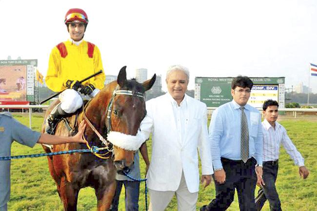 Jaydev Mody leading his horse Zander which won on Thursday 