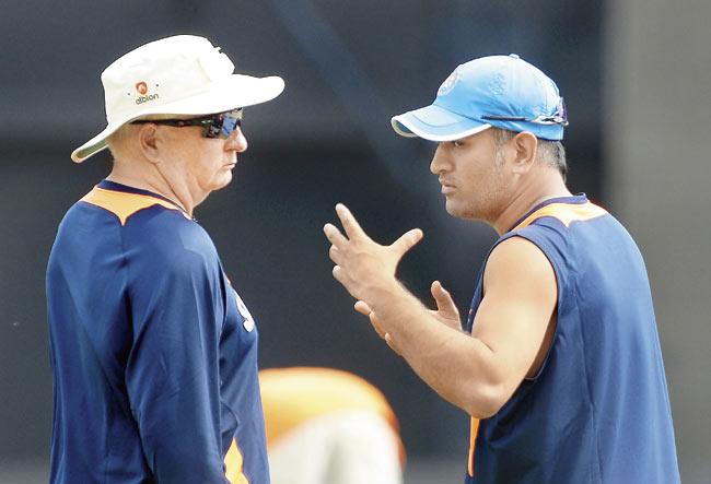 Skipper Mahendra Singh Dhoni and coach Duncan Fletcher should have produced far better results abroad. Pic/AFP