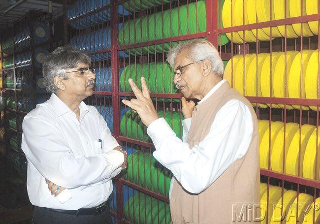 Nitin Potdar and Dr Jabbar Patel in the storage room at the Films Exhibition Centre