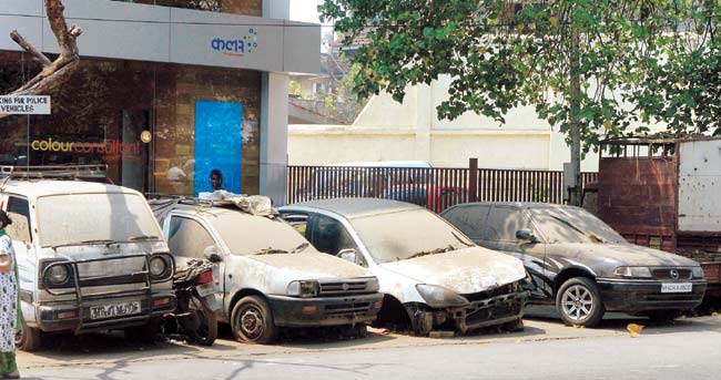Cars that have been seized by the police in various cases parked outside the Bandra Police station.  PIC/ Rane Ashish 
