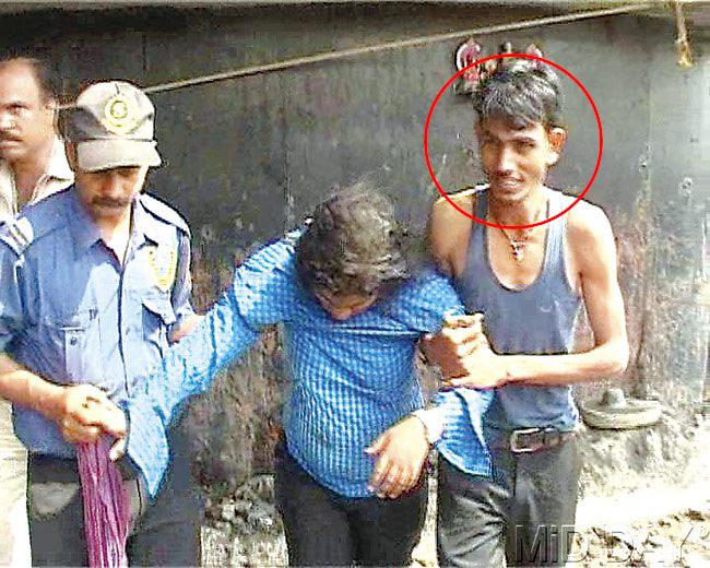 Suraj (circled) assisted his girlfriend after they were rescued