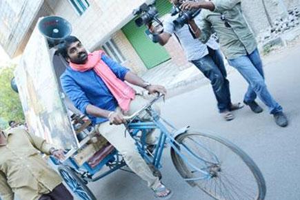 Vijay Sethupathi promotes his film on a tricycle