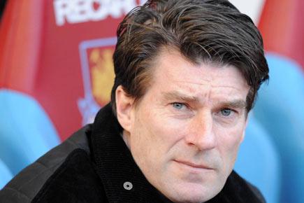 Swansea City sack their manager Michael Laudrup