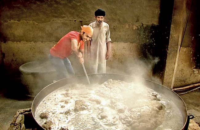 Chef Saransh Goila at the Gurudwara Anandpur Sahib in Punjab where he made a big pot of dal that weighed 200 kg 