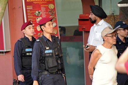 Singapore passes temporary law to keep order in Little India 