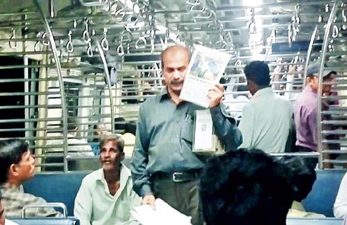 Academic-turned-social worker Sandeep Desai, in a local train to raise funds for setting up schools for underprivileged children