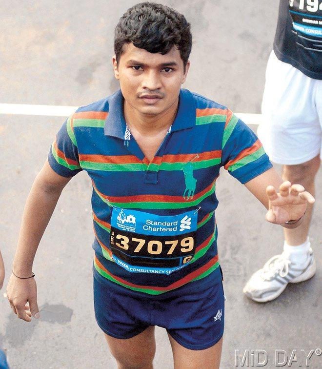 Ashok Patil after finishing the half marathon yesterday. Pic/Atul Kamble