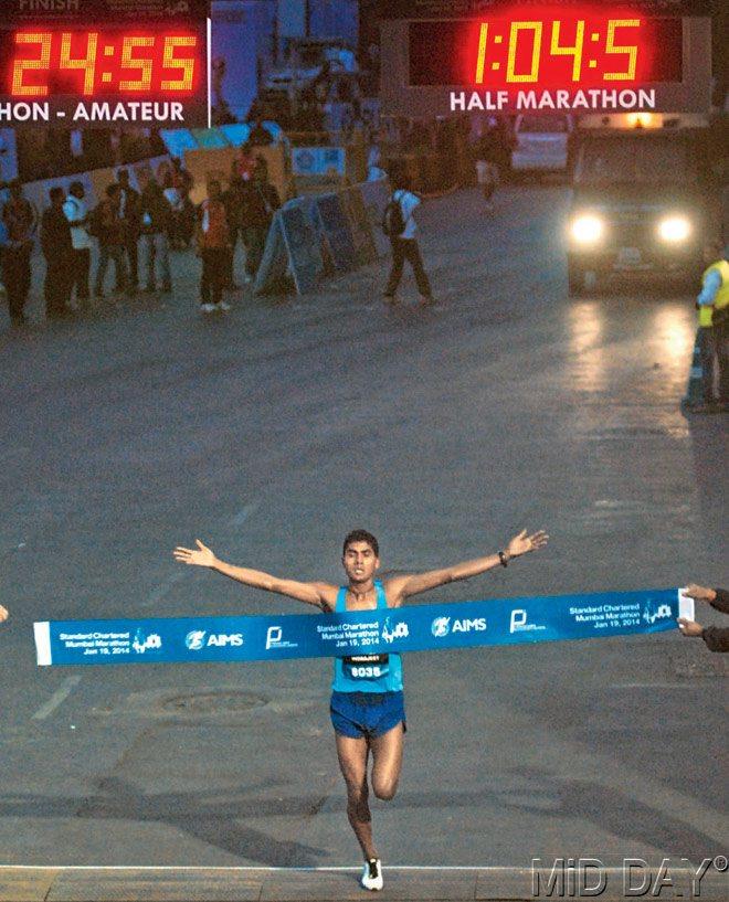 Indrajeet Patel celebrates after winning the half marathon (Indians) yesterday.  Pic/Atul Kamble