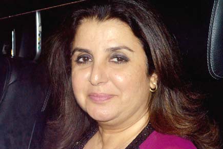 Farah Khan glued to 'Happy New Year' title track