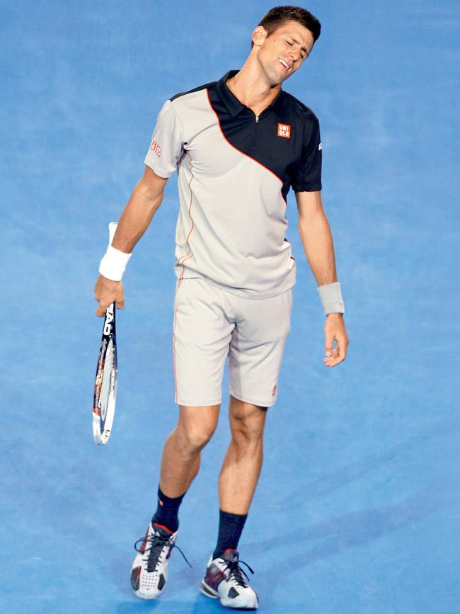 Novak Djokovic looks dejected after dropping a point