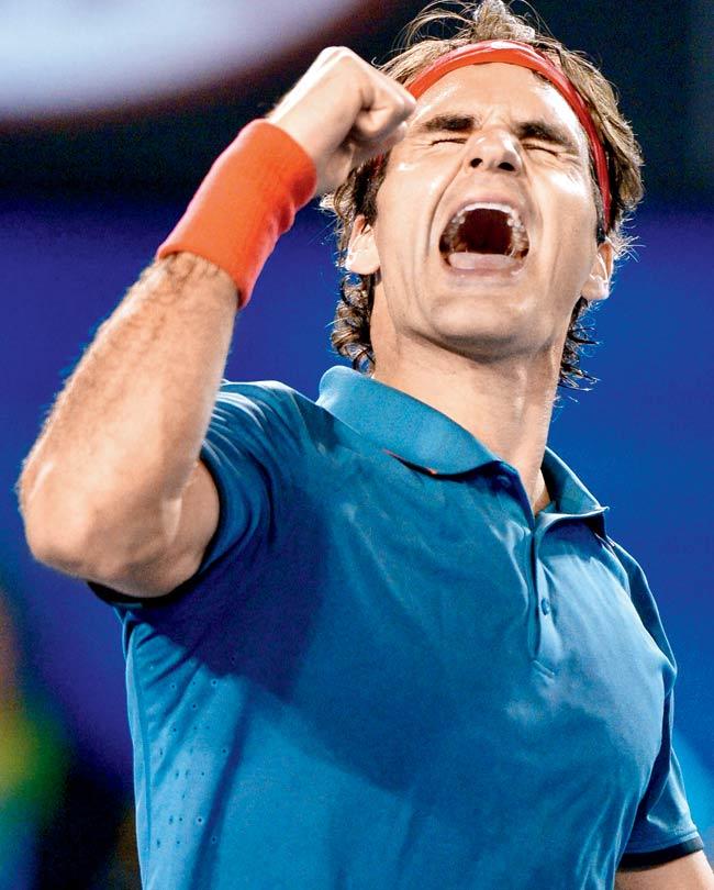 Roger Federer celebrates after beating Andy Murray in Melbourne yesterday. Pic/AFP 