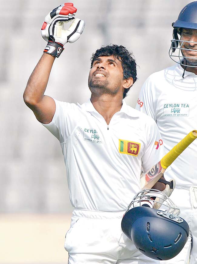 Kaushal Silva celebrates his ton. Pic/AFP