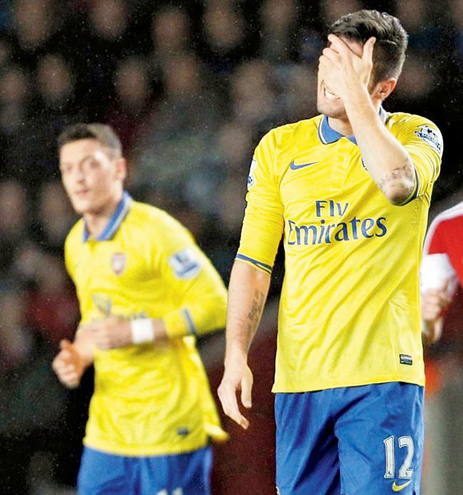 Arsenal striker Olivier Giroud reacts during their  match against Southampton at St Mary
