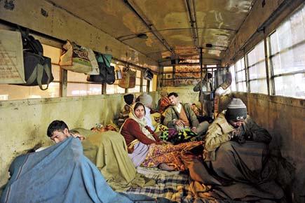 Poor, homeless patients take shelter in old buses in Delhi