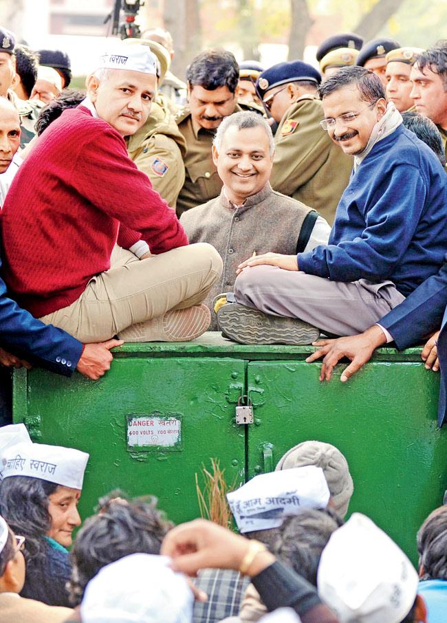 AAP-ocalypse: Delhi CM Arvind Kejriwal, Manish Sisodia and Somnath Bharti during the protest yesterday. Pic/AFP
