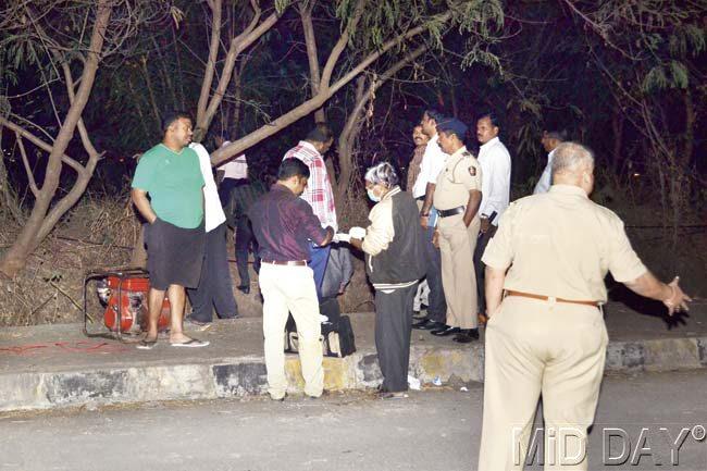 Police officers investigate at the site where Esther Anuhya’s charred body was found in the bushes of Bhandup. Pic/Datta Kumbhar