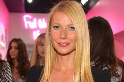 Gwyneth Paltrow flaunts cleavage in plunging neckline jumpsuit