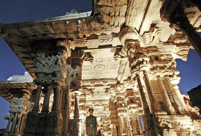 Temples in Hampi boast of rich architectural heritage with intricate carvings. PIC/AFP