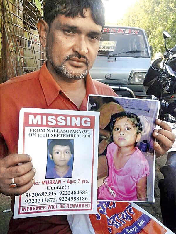 Kamar Alam Khan showing his daughter Muskan’s photograph who went missing from her uncle’s Nallasopara residence in 2010, while the family was celebrating Eid