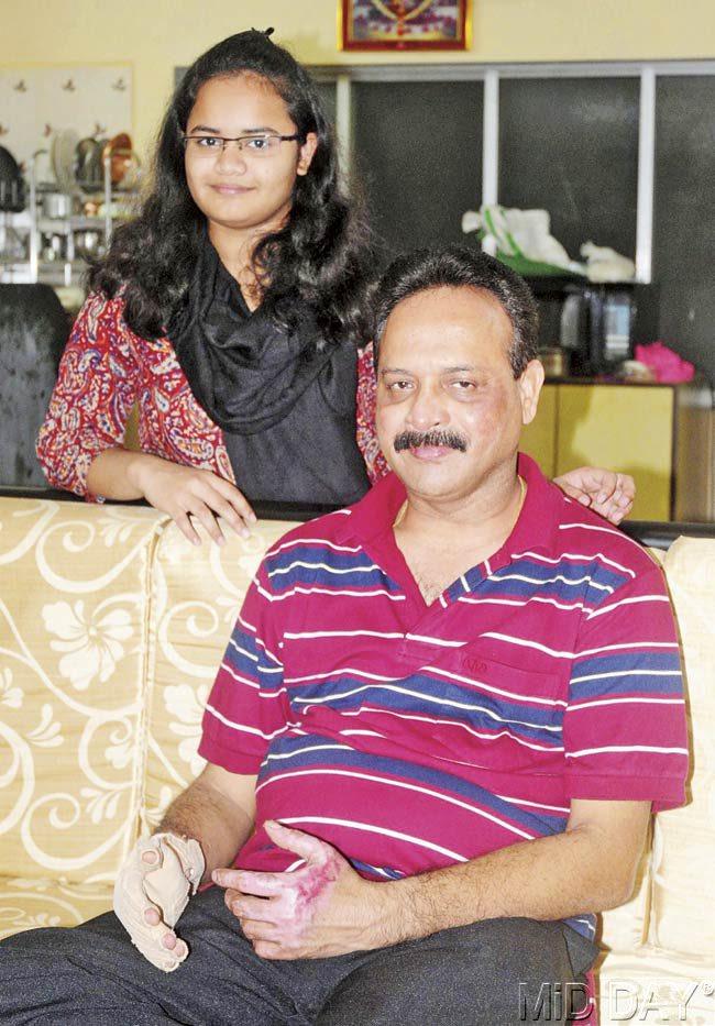 Mahendra Desai, fire officer at Gowalia Tank station, with his daughter Shivani at his Tardeo flat. Pic/Bipin Kokate