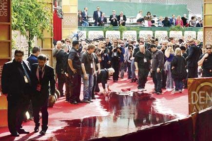 Soggy Globes: Sewage pipe bursts, floods red carpet