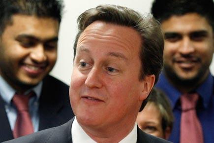 Book stirs controversy by claiming UK PM David Cameron put his 'privates' into dead pig's mouth