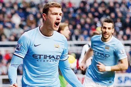 Manchester City beat Newcastle 2-0 to go atop EPL