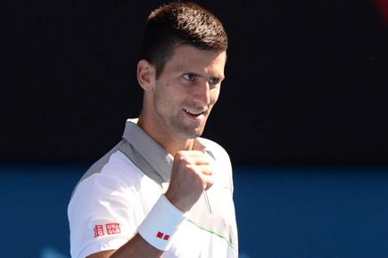 Australian Open: Novak Djokovic bends it like Boris Becker