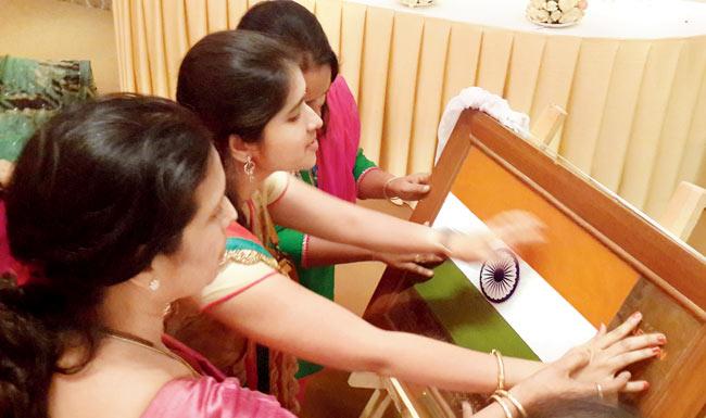 COMING ALIVE: The visually challenged touch the tactile flag