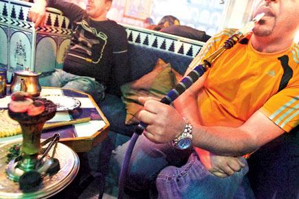 Raided hookah bar staffers flog police informers