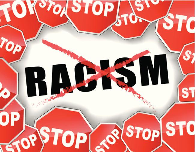 British teen charged with racism